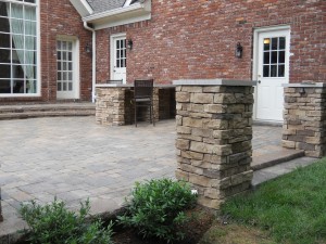brick patio with brick pillars                       