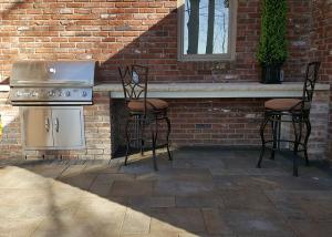 outdoor cooking with grill and bar